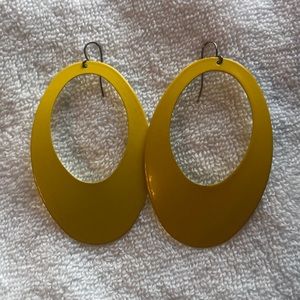Yellow metal hoop earrings